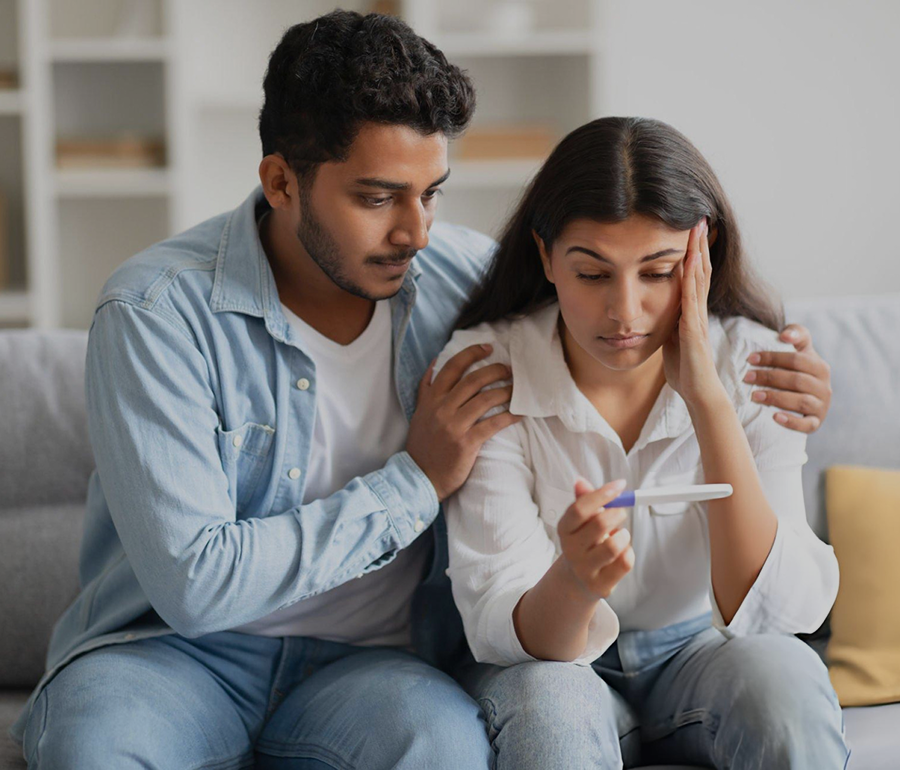 Couple looking at pregnancy test
